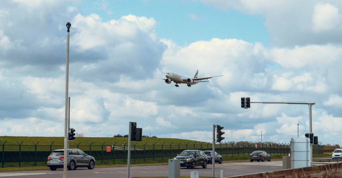 **Subject:** An airplane taking off from an airport runway.