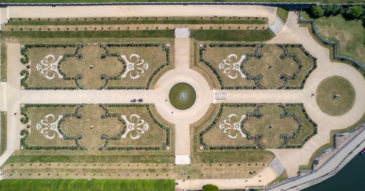 Aerial photograph capturing the intricate design of Hampton Court Palace Gardens in Molesey, England.