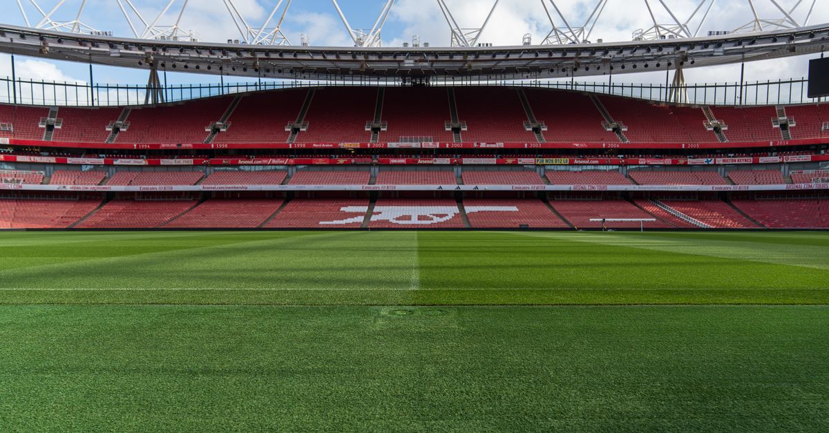 Wide view of an empty Emirates Stadium, home of Arsenal FC, in North London, England.