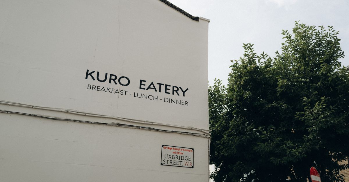 Street view of Kuro Eatery on Uxbridge Street in Notting Hill, London.
