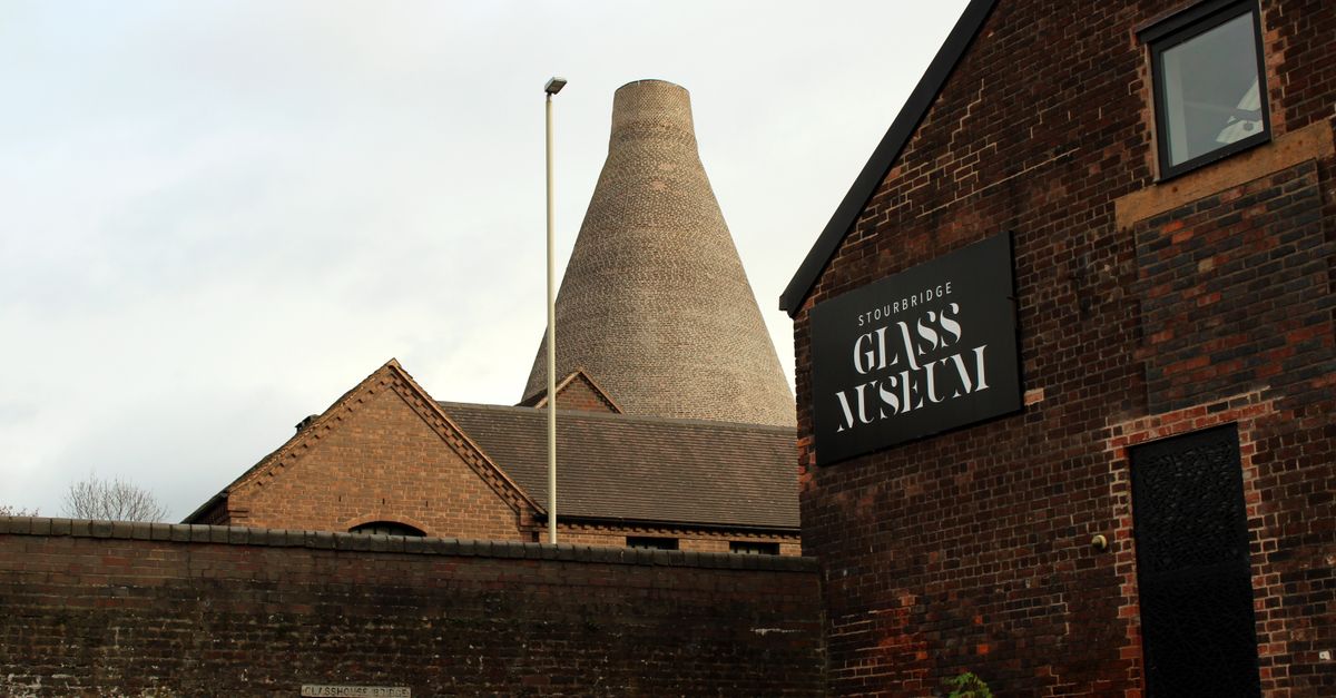 Historic Stourbridge Glass Museum in England with iconic cone structure.
