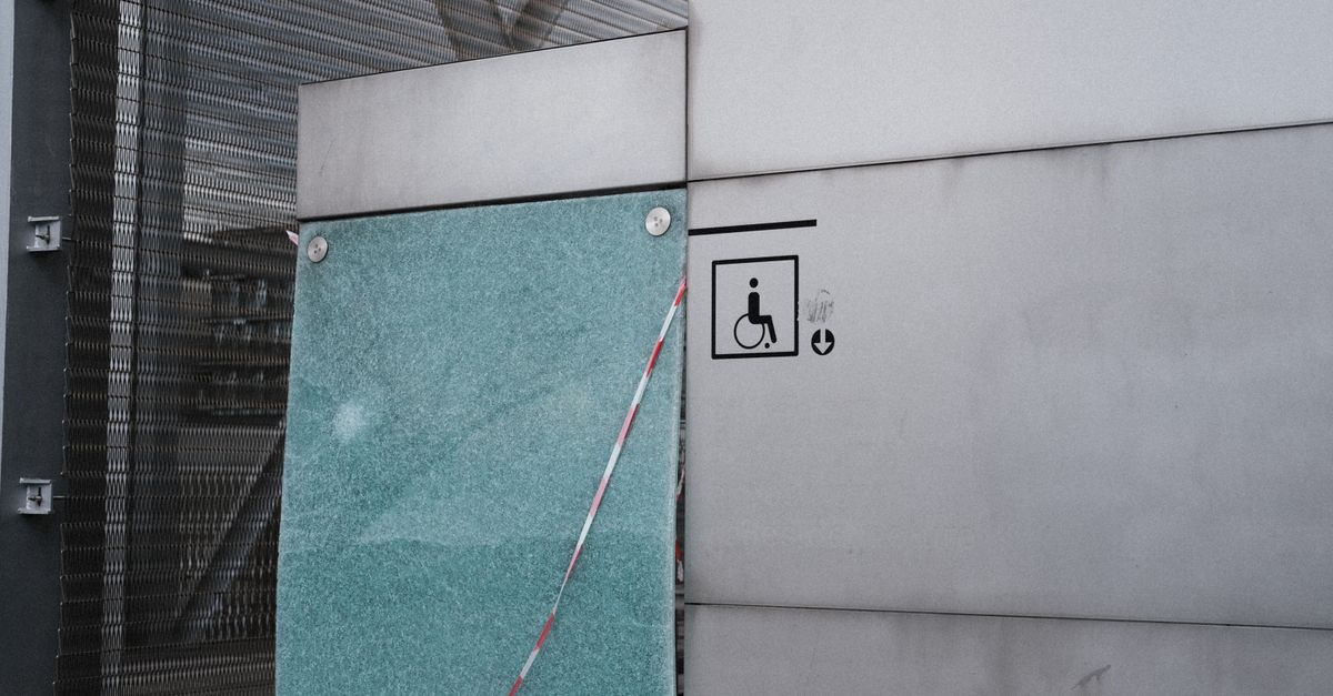 Wheelchair accessibility symbol sign on a terminal building
